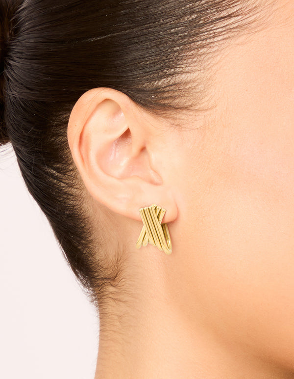 Showcasing waterproof gold plated stainless steel long layered circle hoop earrings on ear view