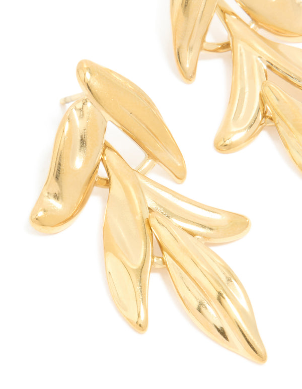 Highlighting waterproof gold plated stainless steel cascading leaf drop stud earrings with intricate detail close up view