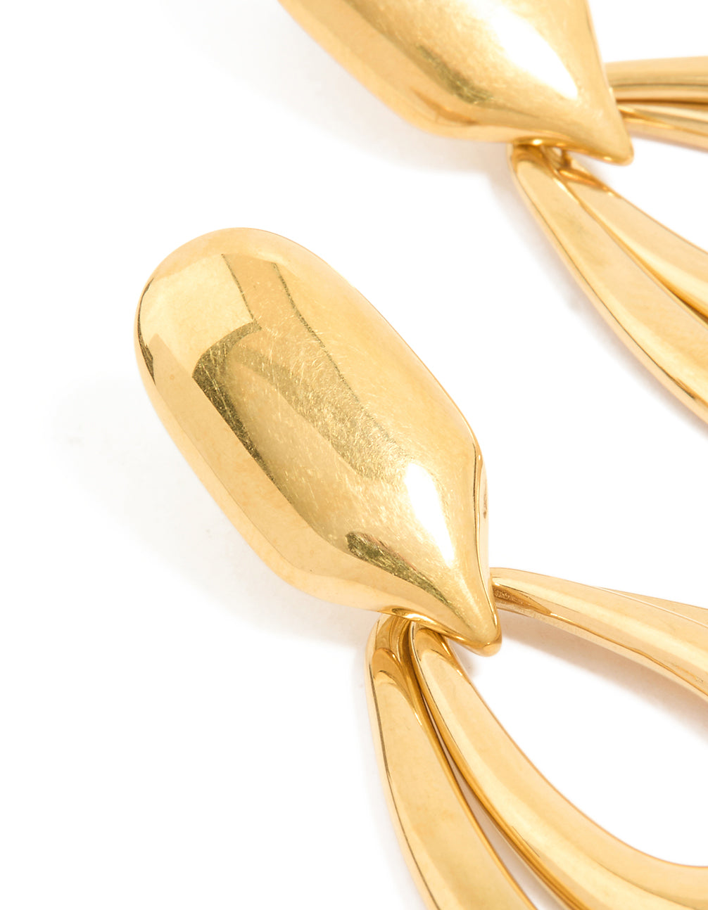 Highlighting waterproof gold plated stainless steel double doorknocker earrings with statement design close up view