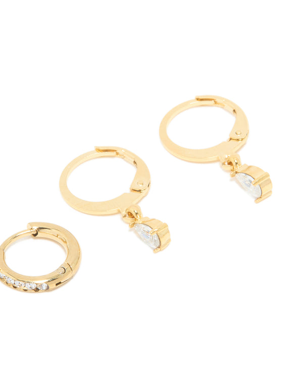 Crafted from waterproof gold plated stainless steel cubic zirconia simple stud and huggie earrings in a 3-pack post detail view