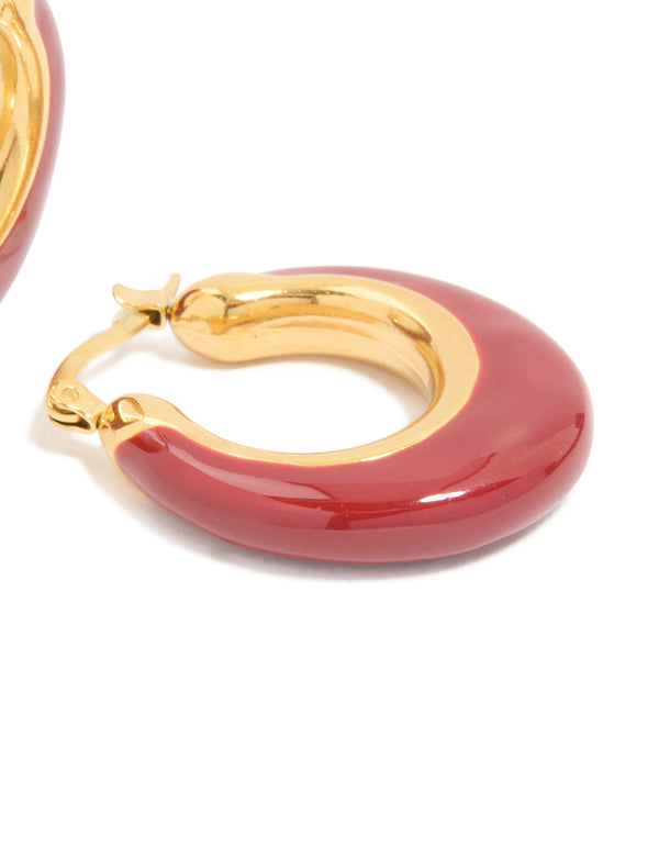 Crafted from waterproof stainless steel with crimson enamel and gold plated statement hoop earrings post detail view