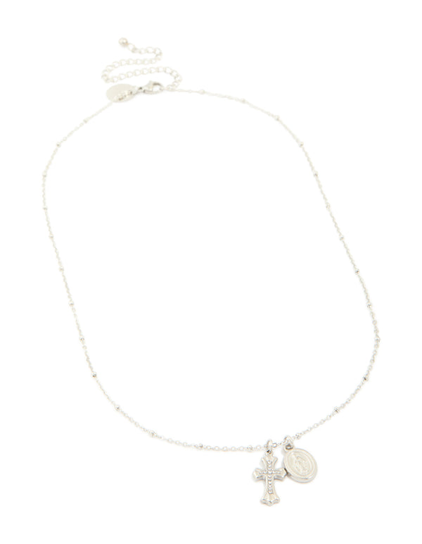 Crafted from waterproof stainless steel necklace with mary charm, cross, and balls in silver featuring statement styling front view