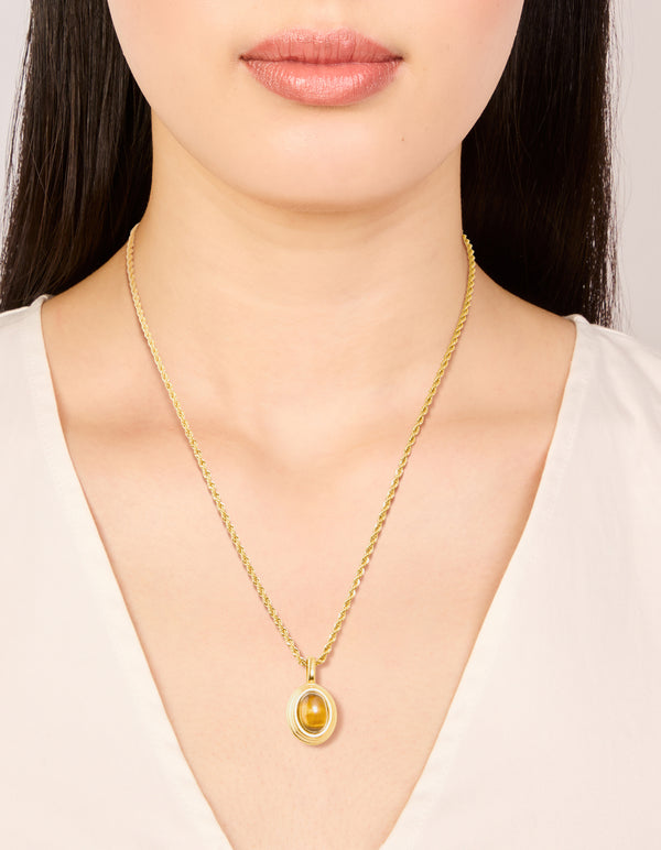 Presenting a waterproof gold plated stainless steel tiger's eye semi precious stone pendant necklace on neck view