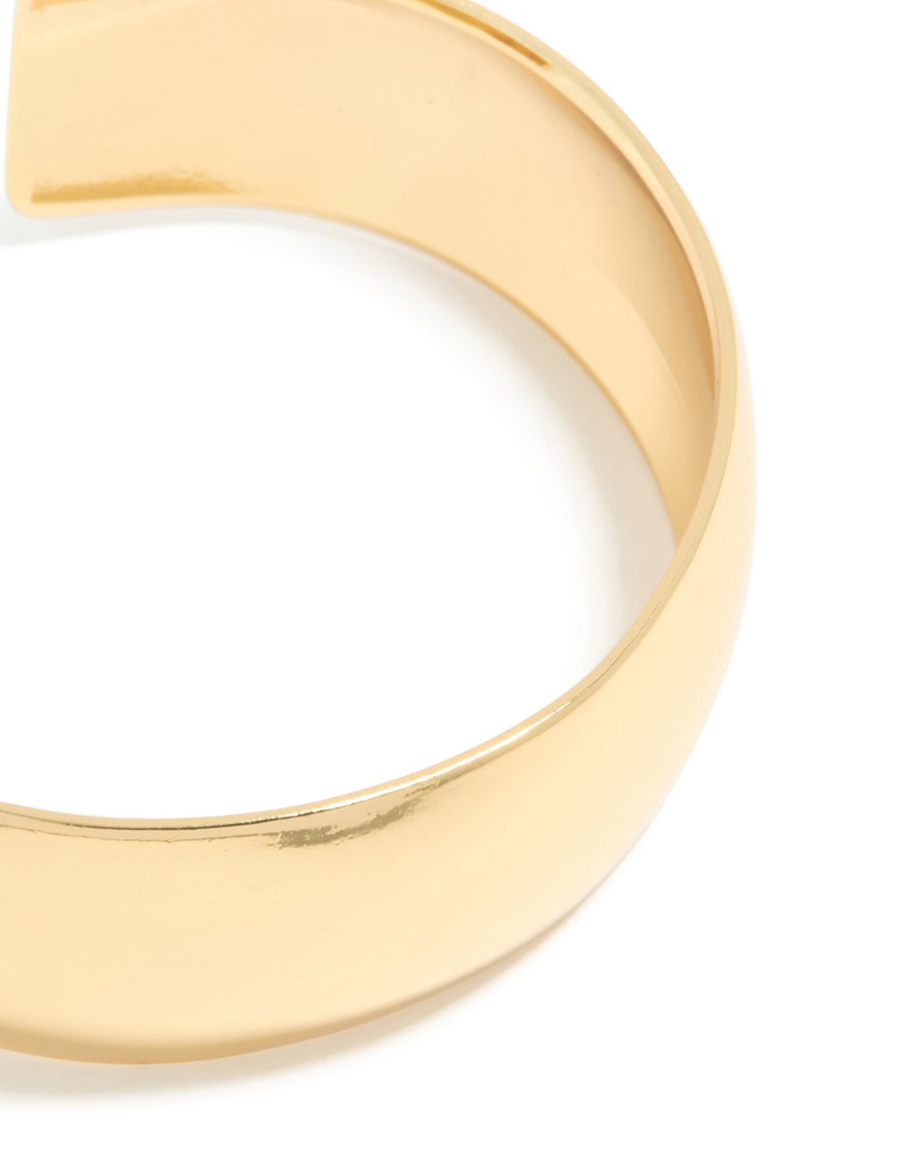Presenting a waterproof thick open wrist cuff made from stainless steel with statement design in gold plated finish close up view