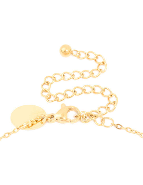Highlighting the waterproof initial necklace with bamboo letter S in gold plated stainless steel clasp detail view