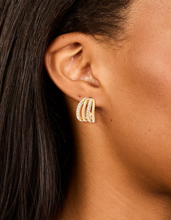 Showcasing waterproof gold plated stainless steel cubic zirconia pave 4-row illusion hoop earrings in statement style on ear view