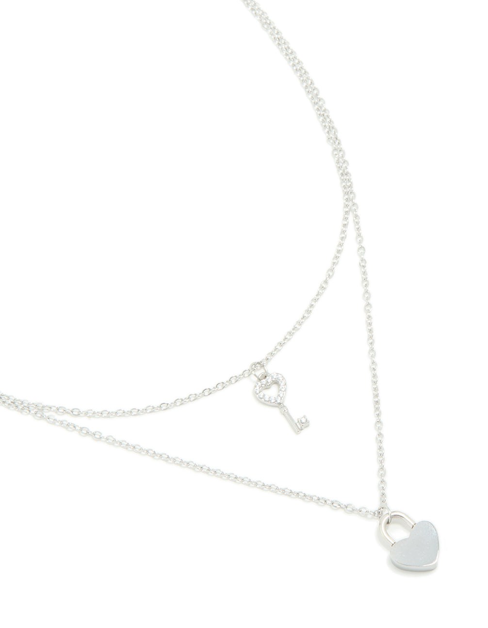 Showcasing a waterproof stainless steel layered necklace featuring key & heart and padlock pendant in silver close up view