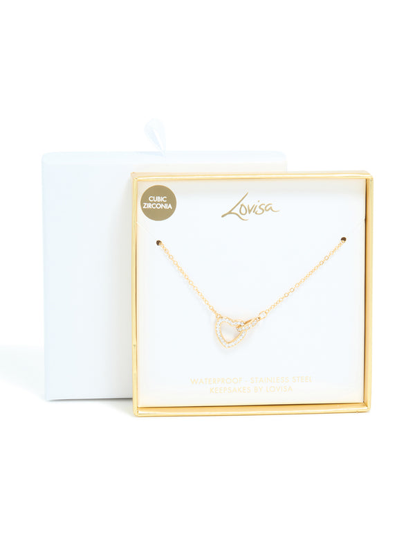 Featuring a waterproof gold plated stainless steel hollow heart necklace with cubic zirconia pendant close up view