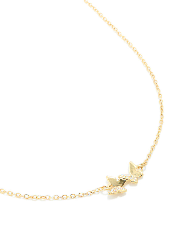 Elegant waterproof butterfly pendant necklace in gold plated stainless steel with cubic zirconia and dainty design close up view