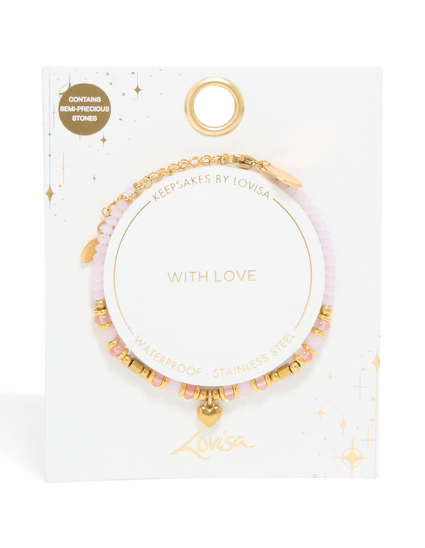 Explore waterproof gold plated stainless steel rose quartz semi precious mini heart bracelet crafted with beads, charm, and dainty details close up view