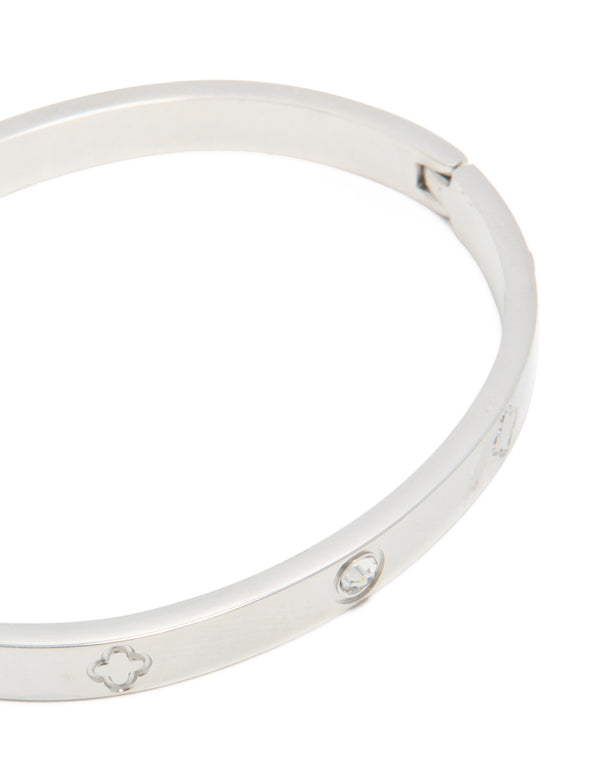 Featuring waterproof stainless steel with cubic zirconia flower details, this silver bangle closure detail view