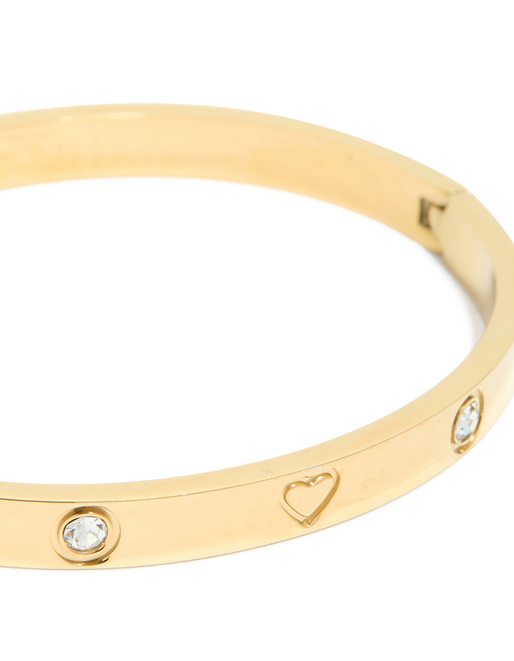 A waterproof gold plated stainless steel cubic zirconia heart bangle close up view