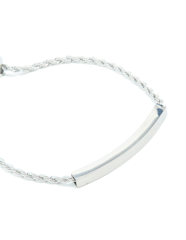 Displaying a waterproof stainless steel twisted engravable toggle bracelet with bar detailing in silver close up view