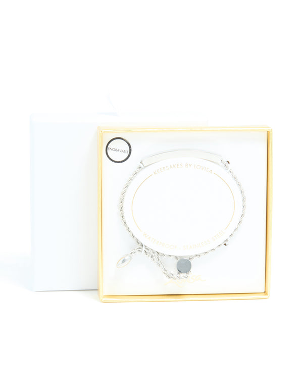 Featuring a waterproof stainless steel twisted engravable toggle bracelet with bar detailing in silver front view