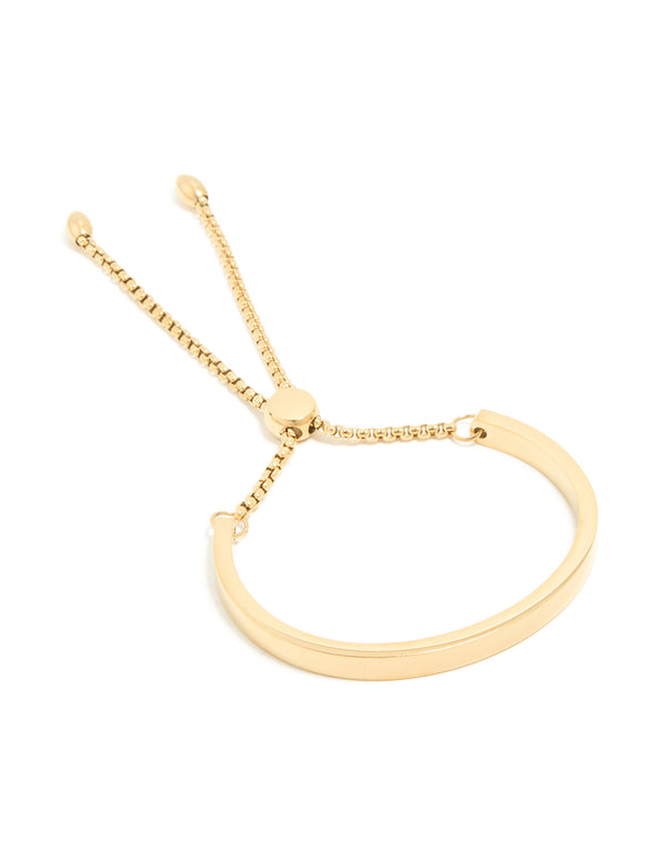 Featuring a waterproof gold plated stainless steel toggle bangle closure detail view
