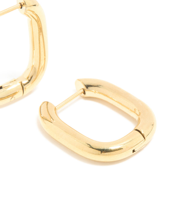Highlighting waterproof gold plated stainless steel chunky oblong huggie earrings in statement style post detail view