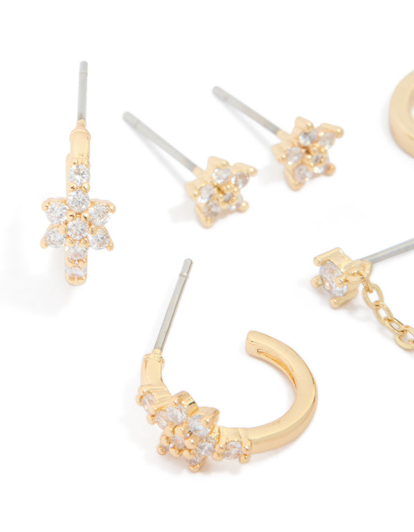 Crafted from gold plated cubic zirconia flower chain and mixed earrings 4-pack, stud and hoop closure close up view