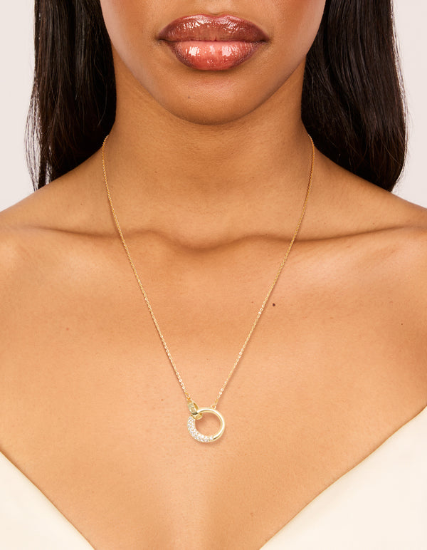 Showcasing a gold plated cubic zirconia linked circle necklace dainty style on neck view