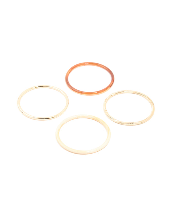 Showcasing a mixed acrylic bangles 4-pack in gold front view