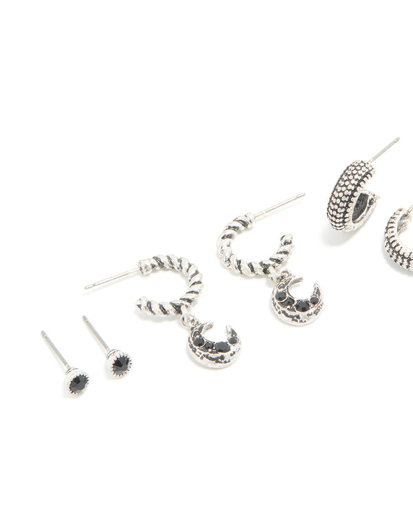 Crafted from textured metal, this celestial 5-pack showcases moon and heart with black accents close up view