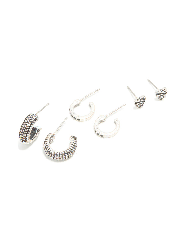 Shop silver celestial earrings with moon and heart features in a 5-pack, including hoop and stud styles post detail view