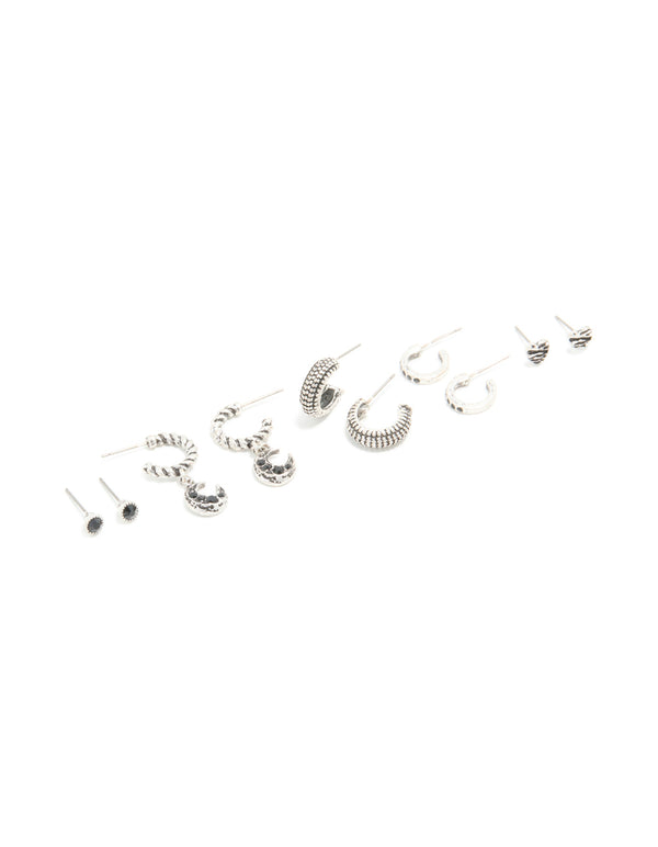 Discover a celestial 5-pack featuring moon and heart detailing with hoop and stud closures in silver front view