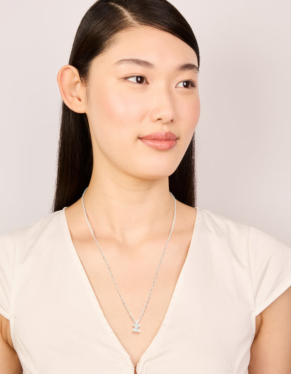 Designed with waterproof stainless steel mini bubble letter Z necklace featuring initials pendant in silver and dainty style on model view