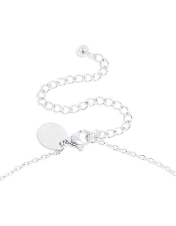 Showcasing waterproof stainless steel construction with initial bubble letter S in silver, this dainty necklace highlights a clasp detail view