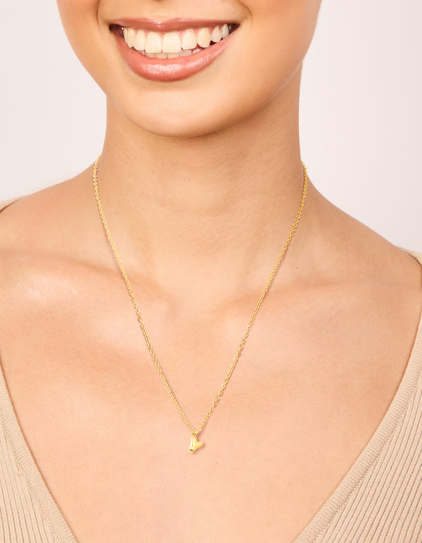 Discover this waterproof initial letter Y necklace in gold plated stainless steel with a dainty style on neck view