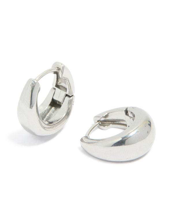 Featuring surgical steel bold oval hoop earrings in silver front view