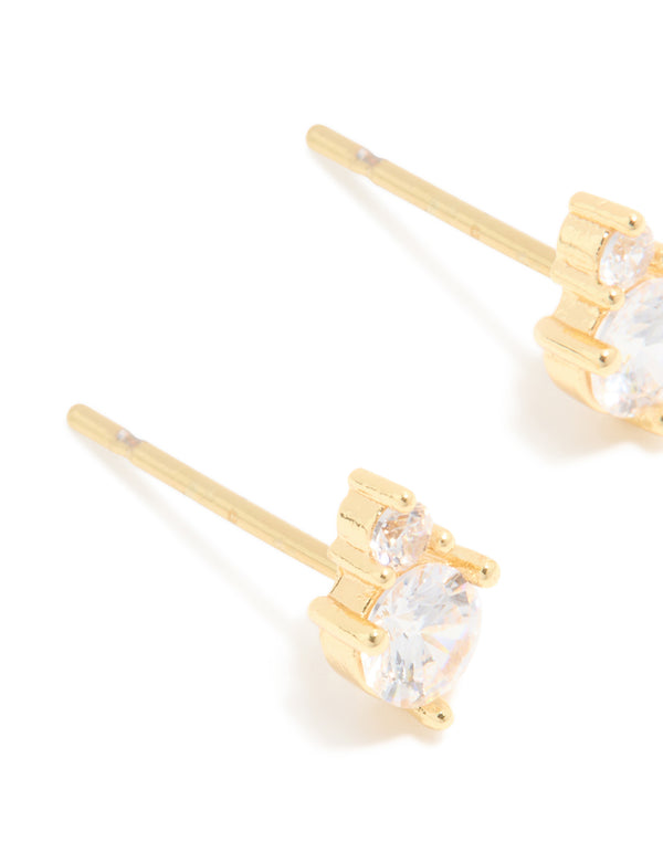 These waterproof gold plated stainless steel duo stud earrings showcase round cubic zirconia stones in clear close up view