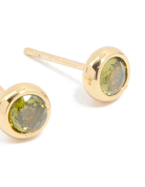 Highlighting waterproof gold plated stainless steel cubic zirconia August birthstone bezel set stud earrings with olive stones post detail view