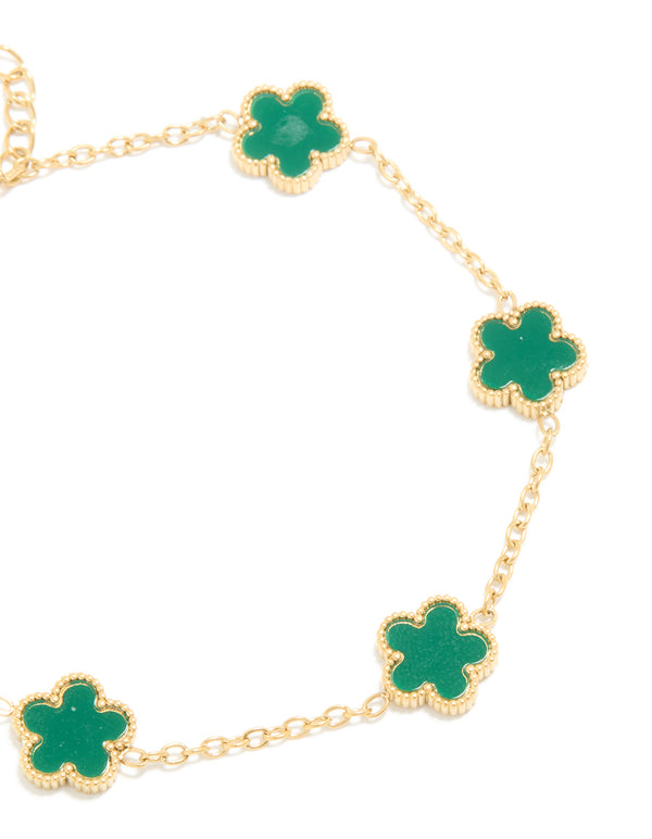 Designed with waterproof gold plated stainless steel dark green petal flower charm bracelet close up view