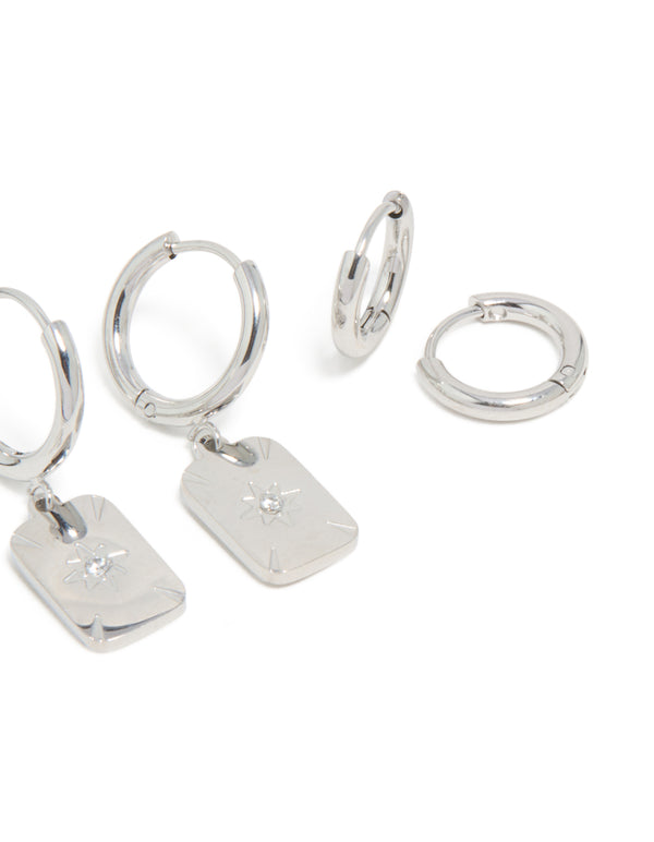 Designed with waterproof stainless steel star and disc earrings in a 3-pack featuring celestial with stud and huggie closure in silver post detail view