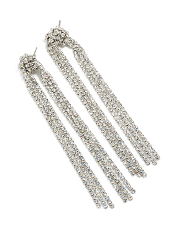 Elegant silver diamante knotted tassel drop earrings with statement design front view
