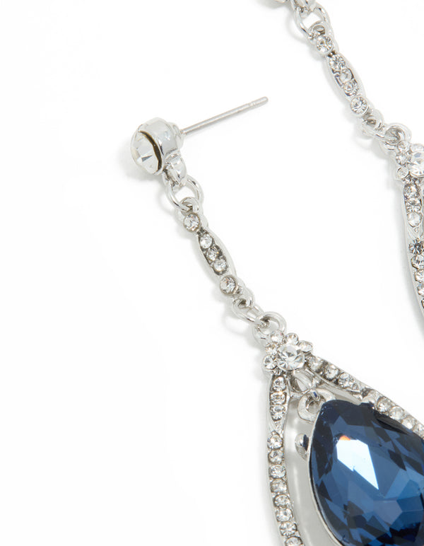 Stunning silver blue diamante pear glitzy drop earrings showcasing stud closure detail in close up view