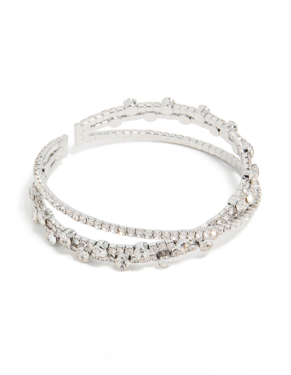 Elegant silver diamante crossed circle wrist cuff, statement bangle in front view
