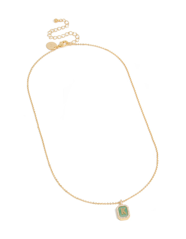 Featuring a gold plated brass cubic zirconia letter K tag necklace with initials pendant front view