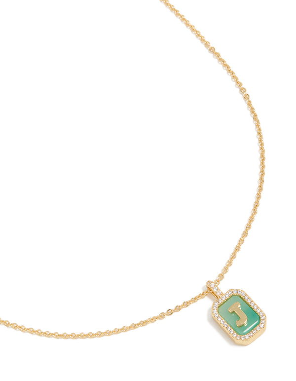 Discover a gold plated brass cubic zirconia letter J tag necklace with pendant featuring initials in statement style close up view