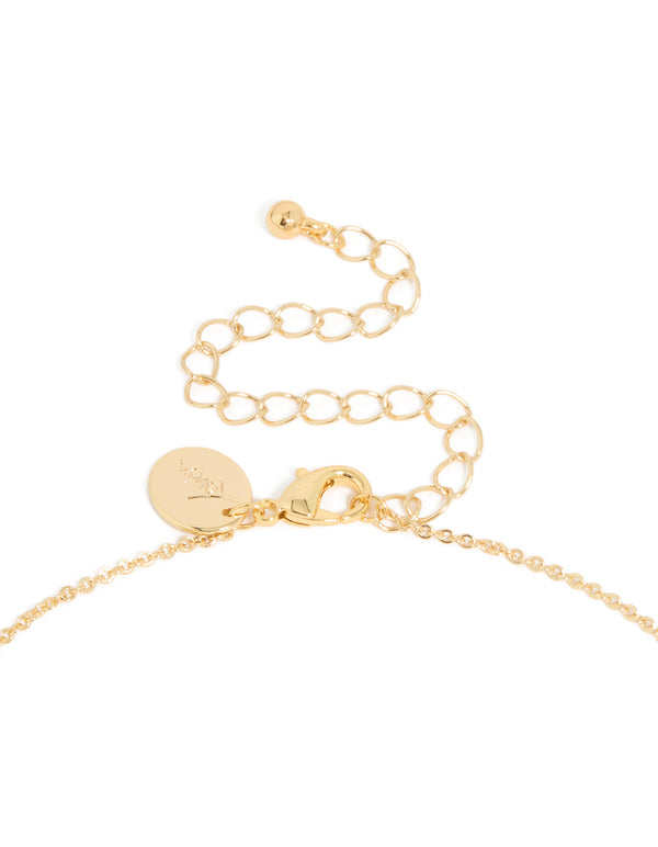 Highlighting a gold plated brass cubic zirconia letter S tag necklace with initials pendant clasp detail view