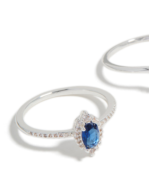 Crafted from silver plated pear and blue cubic zirconia crown stacking rings 2-pack with crystal close up view