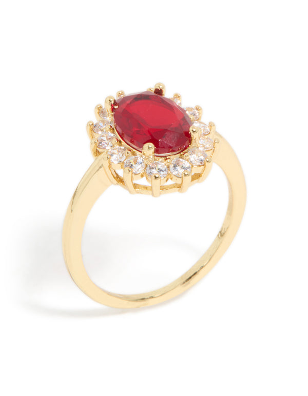 Eye-catching statement ring with oval cut red cubic zirconia and clear halo stones crafted from gold plated metal side detail view