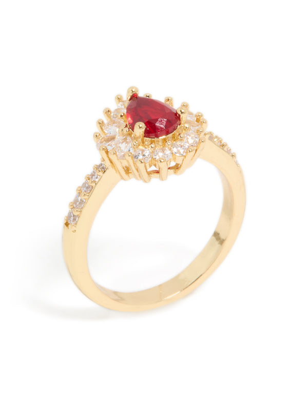 Designed with gold plated material, gleaming red cubic zirconia pear ring featuring crystal and clear stone accents side detail view