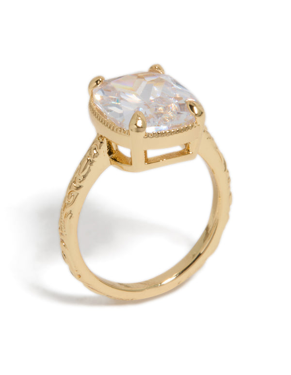 Featuring a gold plated vintage ring with cubic zirconia crystal in a statement style side detail view