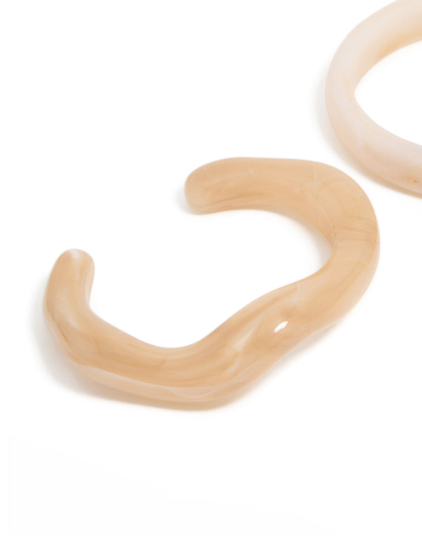Crafted with cream neutral acrylic marble wrist cuff and bangle 2-pack featuring chunky statement design in close up view