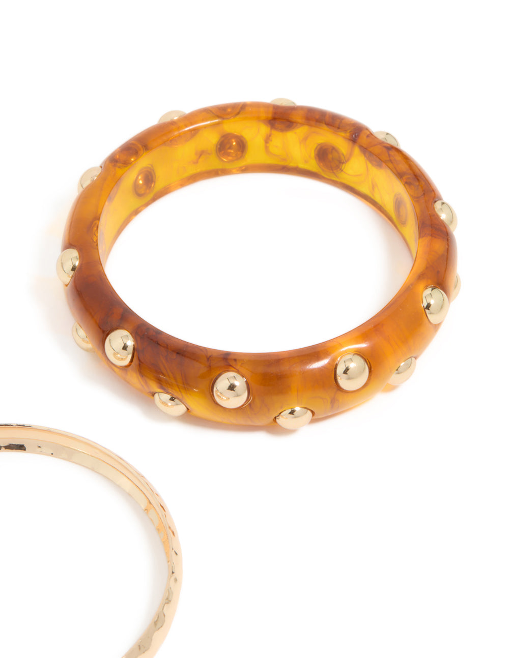 Shop this 2-pack studded acrylic bangle set with gold and brown hues in close up view