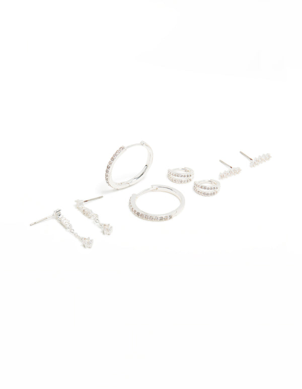 Showcasing large charm hoop and cuff earrings crafted from brass with cubic zirconia crystal accents in a 4-pack featuring hoop and stud closures front view