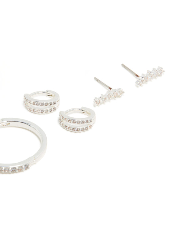 Displaying charm hoop and cuff earrings in brass with cubic zirconia crystals featuring hoop and stud closures in a 4-pack post detail view
