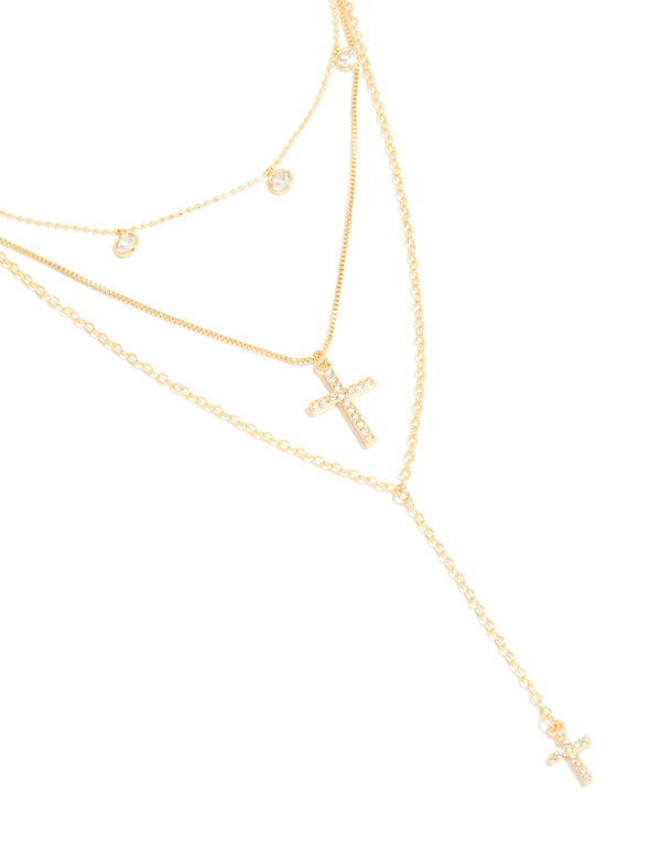 Beautifully crafted cubic zirconia droplet and cross layered Y-necklace in gold plated finish with statement styling in front view