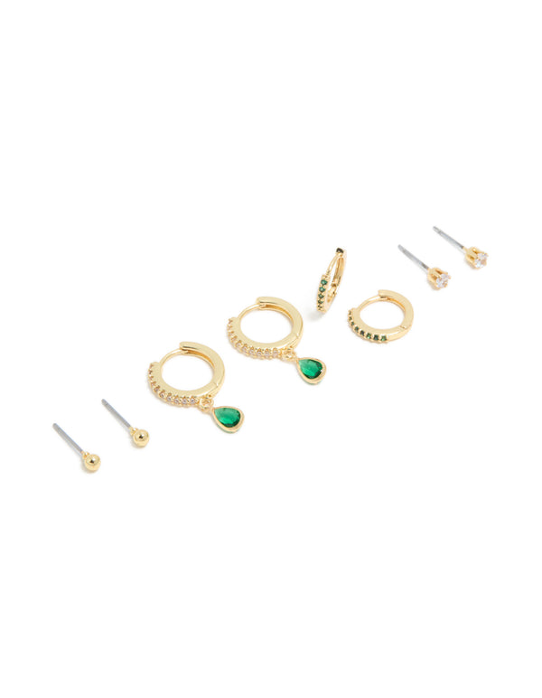Showcasing dainty gold plated brass emerald cubic zirconia May birthstone earrings 4-pack with ball details, huggie and stud closure, and crystal green accents front view